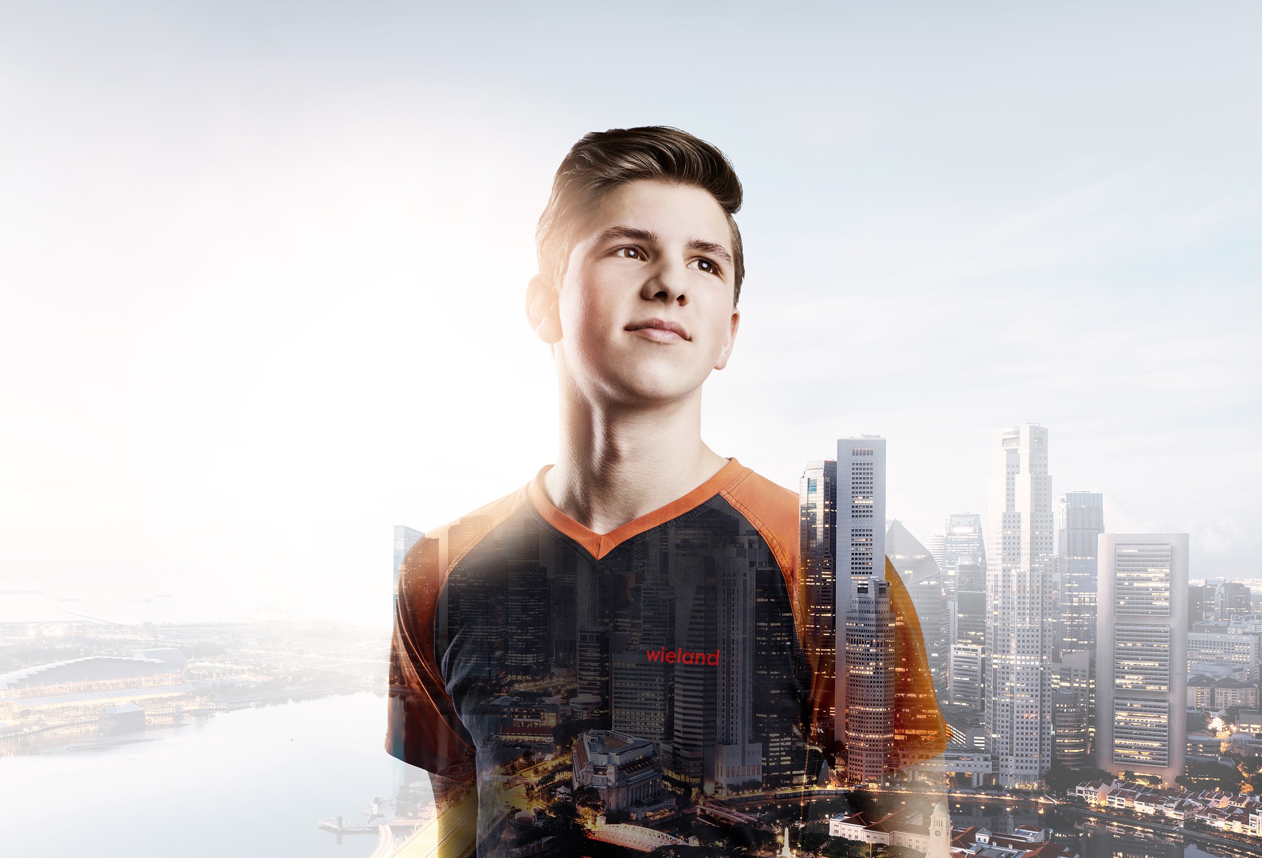 Trainee Noah with Singapore skyline in the background