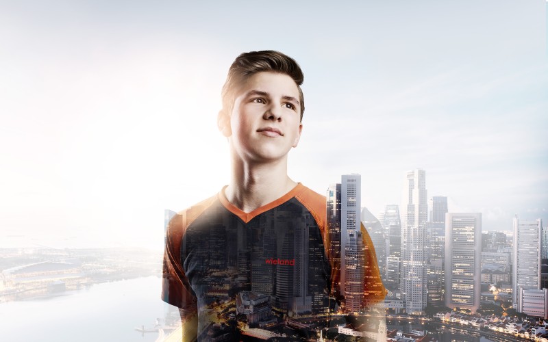 Trainee Noah with Singapore skyline in the background